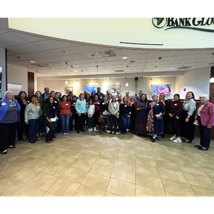 2025 Banking for the Community big group photo of all nominees in the BankGloucester lobby.