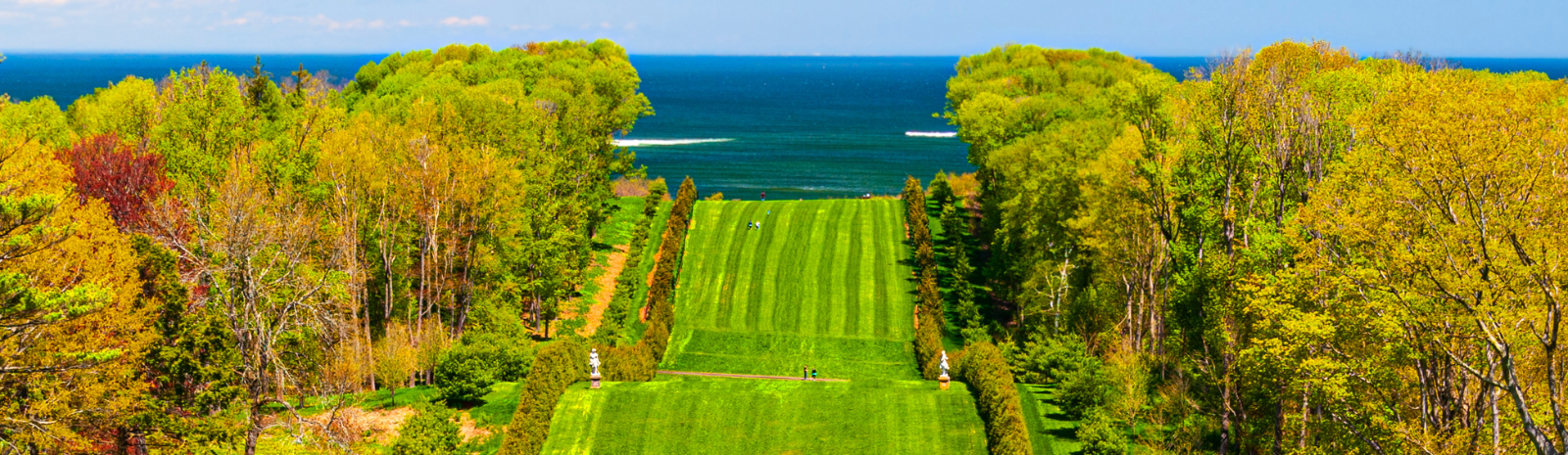 The Grand Allée at Castle Hill on the Crane Estate in Ipswich, Massachusetts, with the ocean in the background.