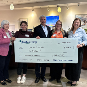 BankGloucester President presenting $5,000 check to Cape Ann Animal Aid team for the 2025 Banking for the Community program.